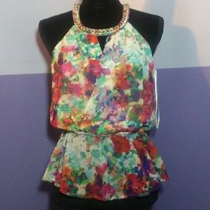 Colorful blouse with chain detail